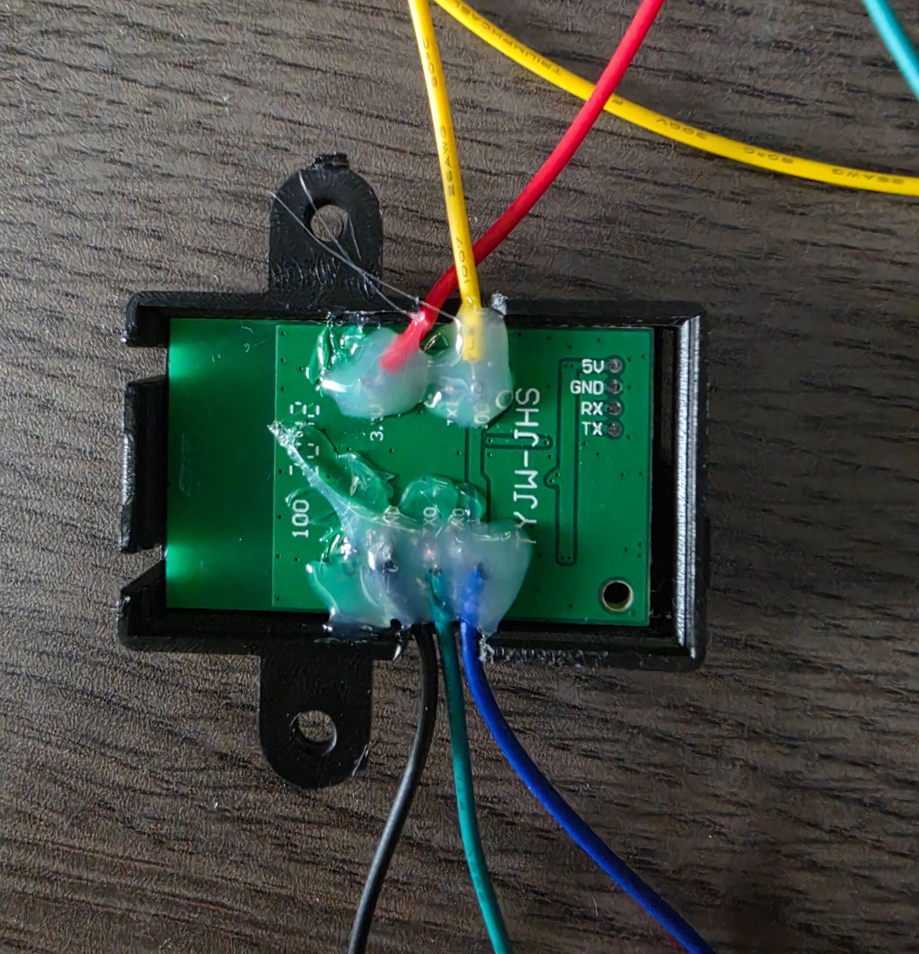 Wires soldered onto the TYWE1S wifi module